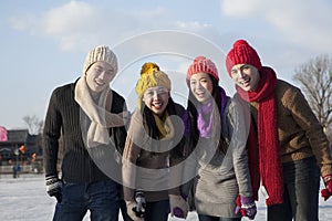 Friends on ice rink