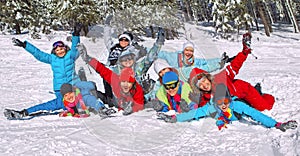 Friends laid on the snow photo