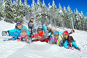 Friends laid on the snow