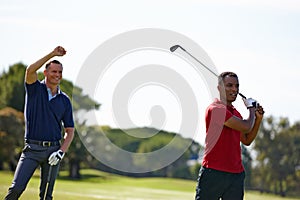 Friends, men and golf with swing for hobby, recreation and exercise on grass field outdoor. Happy, group and athlete on