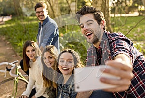 Friends in the park making a selfie