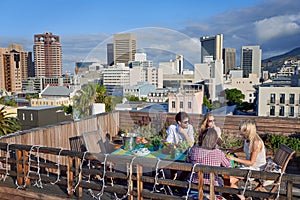 Friends party gathering on rooftop