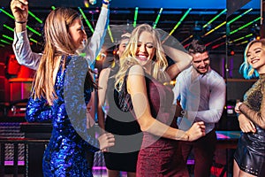 Friends partying in a nightclub