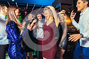 Friends partying in a nightclub