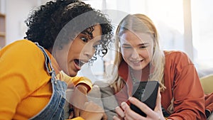 Friends, phone and talking on a home sofa with internet connection, social media and online chat. Women laughing