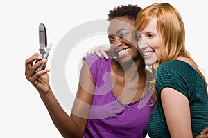 Friends photographing themselves with cell phone