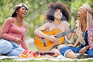 Friends, picnic in nature with guitar and smile or laugh as woman play music instrument. Black woman relax, happy