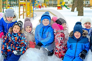Friends play at the winter playground