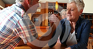 Friends playing arm wrestling with each other 4k