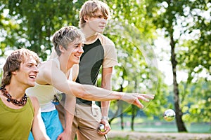 Friends playing boule photo