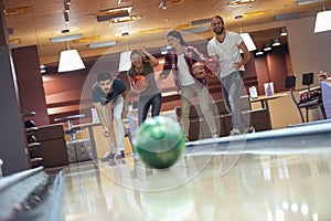 Friends playing bowling