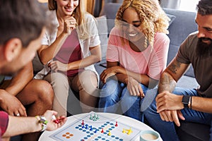 Friends playing ludo