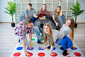 Friends playing twister