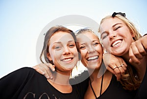 Friends, portrait and women hug outdoor for travel, bond and having fun on vacation, break or trip. Face, smile and