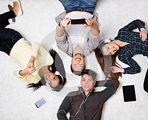 Friends relaxing with gadgets