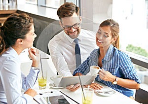 Friends in restaurant talking coffee fun businesspeople