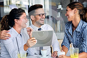friends in restaurant talking coffee fun businesspeople