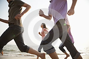 Friends Running at the Beach