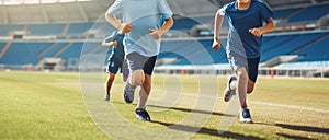 Friends running on the green grass at the stadium. Little children run and train at the stadium on a sunny day. Generative AI