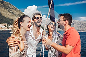 Friends sailing on yacht. Vacation, travel, sea, friendship and people concept