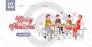 Friends sitting at table having christmas dinner merry xmas happy new year winter holidays celebration concept greeting