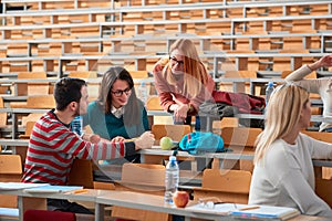 Friends students studying together at university campus