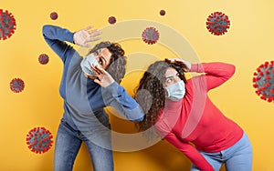 Friends are surrounded by viruses and bacteria. concept of coronavirus covid-19 pandemic. yellow background