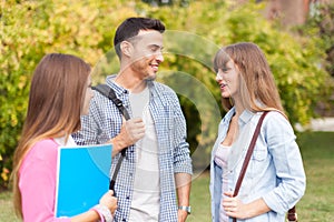 Friends talking in a park