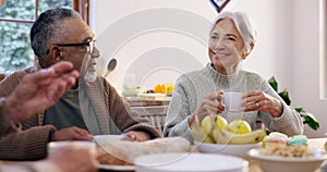 Friends, tea party and a group of senior people in the living room of a community home for a social. Retirement, smile