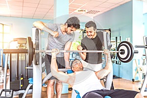 Friends training in a gym