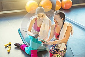 Friends young woman Communicate after training in a sports club.