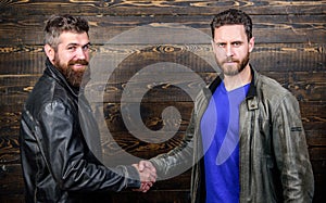 Friendship of brutal guys. Approved business deal. Handshake gesture meaning. Handshake symbol of successful deal. Have