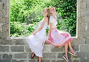 Friendship concept. Girls friends summer dress outfit nature background. Revelation and sincerity. Carefree youth
