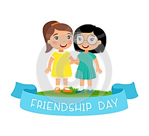 Friendship Day. Two Ñute little european and asian girls hugging