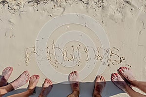 Friendship Etched in Sand: Vacationers inscribe 'Bahamas' on Great Stirrup Cay's Shore photo