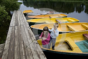 Friendship. kids playing in boat