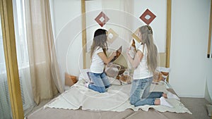 Friendship leisure joy pillow fight teen girls fun