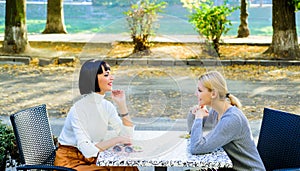 Friendship meeting. Togetherness and female friendship. Conversation of two women cafe terrace. True friendship friendly