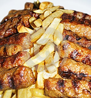 Fries and grilled meat