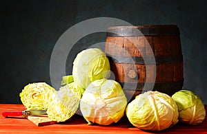 Friesh cabbage and a wooden barrel