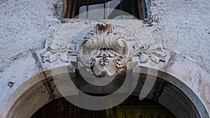 frieze on the ancient door of Taurasi, Avellino, Italy. stone decoration