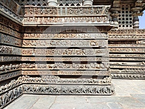 Friezes of animals, scenes from mythological episodes at the base of Hoysaleshwara temple