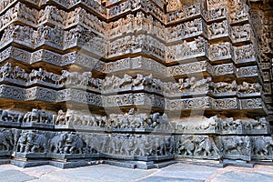 Friezes of animals, scenes from mythological episodes from Ramayana and Mahabharata, at the base of temple, Hoysaleshwara temple,