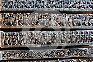 Friezes of animals, scenes from mythological episodes from Ramayana and Mahabharata, at the base of temple, Hoysaleshwara temple,