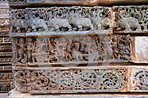 Friezes at the base of temple. Kedareshwara temple, Halebidu, Karnataka, India
