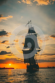 The Frigate Shtandar in calm weather sailing sunset time Riga Latvia