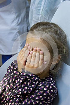 Frightened girl at dentist's