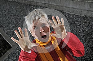 Frightened middle aged woman