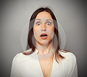 Frightened woman looking at camera