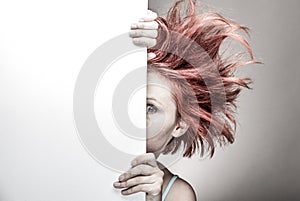 Frightened woman with messy hair